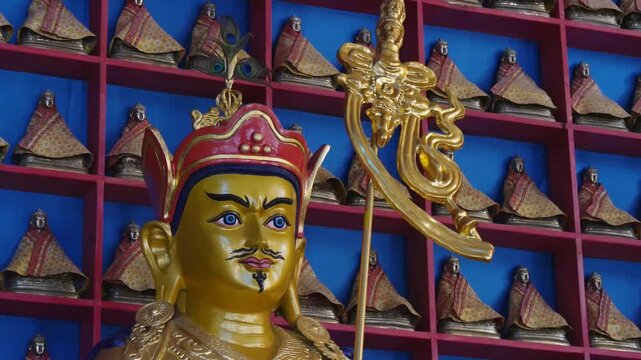 The interior of a Buddhist temple in Mongolia. Bronze figure of a Tibetan Saint.