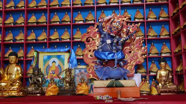 The interior of one of the many Buddhist temples in Mongolia. Bronze figures of deities and saints.