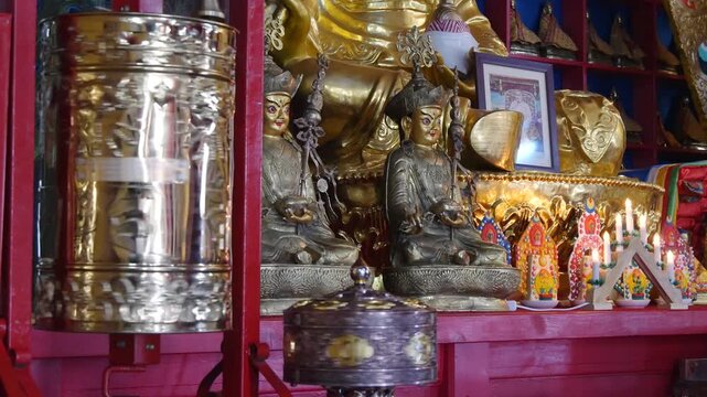 The interior of one of the many Buddhist temples in Mongolia. Bronze figures of deities and saints.