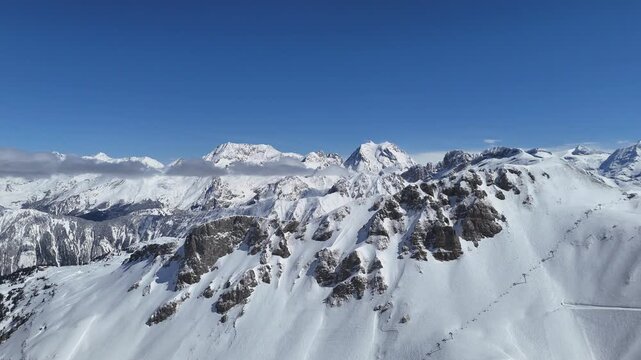 Aerial view of snowcapped French alps by winter shot with drone
