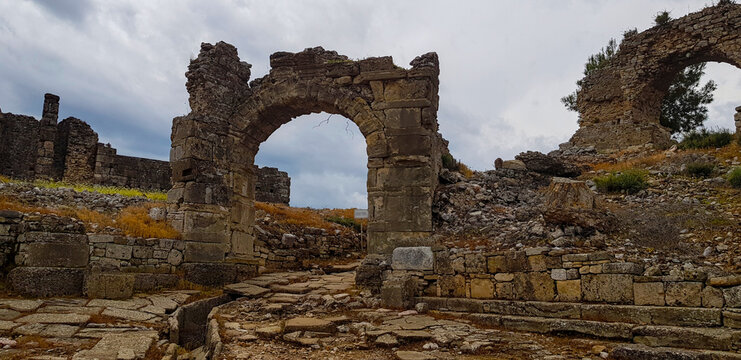 Ruins of a gate in ancient city of Aspendos near Antalya, Turkey
