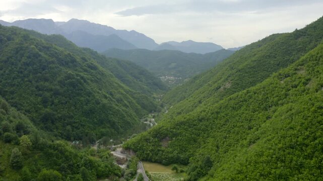 Hidden  Valley and Small village Among endless green mountain in Bosnia