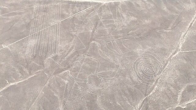 Panoramic view of the ancient Nazca Lines in the Peruvian desert. UNESCO World Heritage archaeological site and geoglyphs.