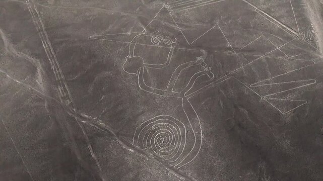The Monkey geoglyph in the Nazca Lines, Peru. Ancient archaeological site and UNESCO World Heritage in the desert.