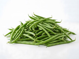 Fototapeta premium A generous pile of fresh, vibrant green beans is displayed against a clean white background.
