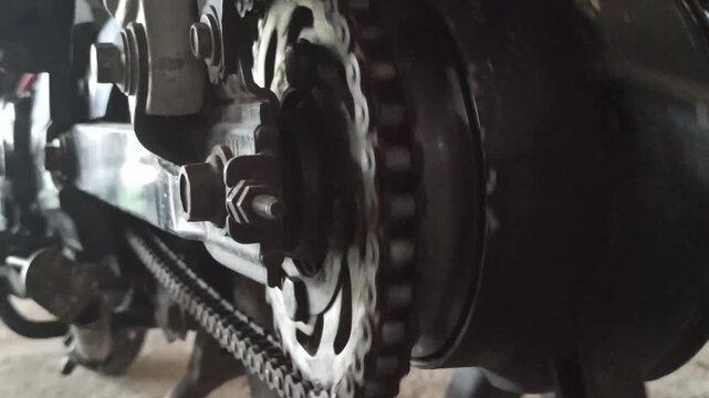 A motorcycle chain on an underbone bike transfers engine power to the rear wheel, highlighting its function, durability, and role in smooth riding performance.
