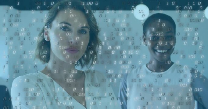 Standing two mid-adult women shifting from neutral to smiling in modern office, with binary overlay