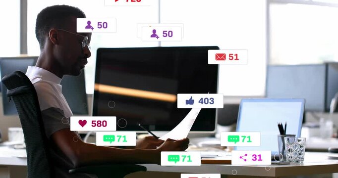Worker reading paper, gesturing while alerts appearing crowding monitors fading, showing overload