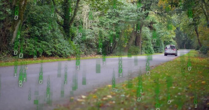 On van entering frame, minivan moving right, receding while binary digits rising to show data flow
