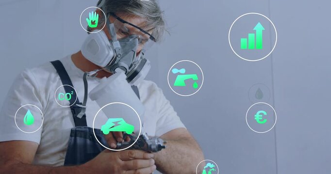 Green data icons appearing, tradesperson adjusting and priming spray gun for safe painting prep