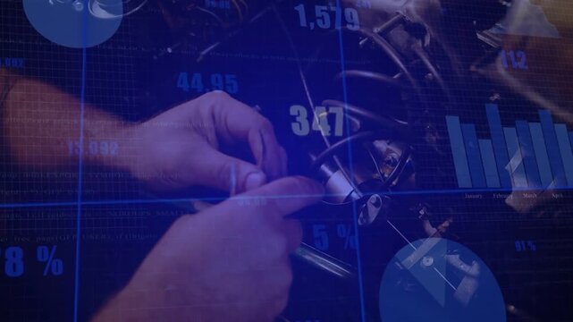 Vertical video: Mech hands reaching routing cable for safe fit while blue charts updating over work