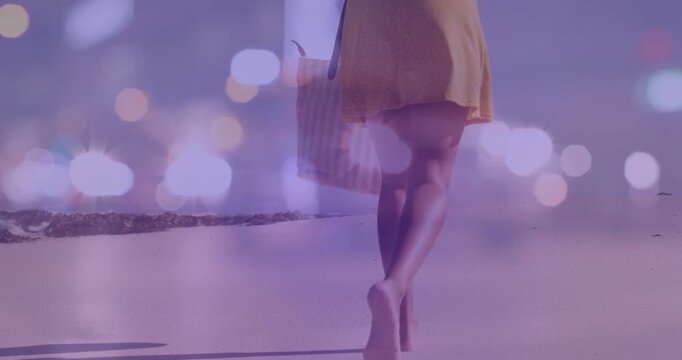 Woman walking shore, first step showing dress and tote, relaxing for travel, purple bokeh adding