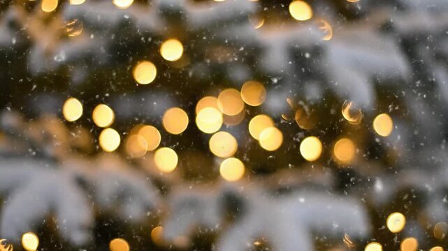 Soft focus winter scene with glowing lights and falling snow