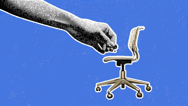 A hand reaches down towards a miniature office chair