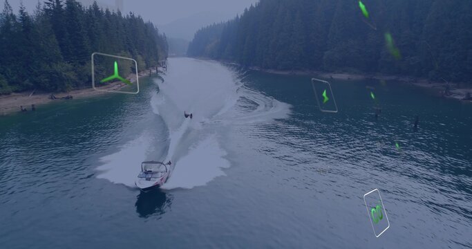 Cruising tow boat, waterskier wearing PFD cutting across forest lake forming wake and green icons