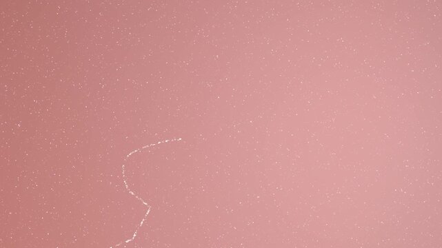 Fast orange burn flashes with grunge scratch film texture on dark background. Designed for cinematic overlays. Ideal for vintage style edits.