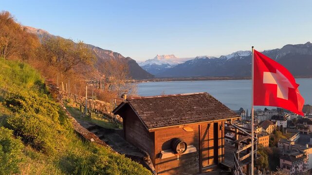 Wooden cabin overlooking Lake Geneva and Swiss Alps at sunset Montreux Switzerland