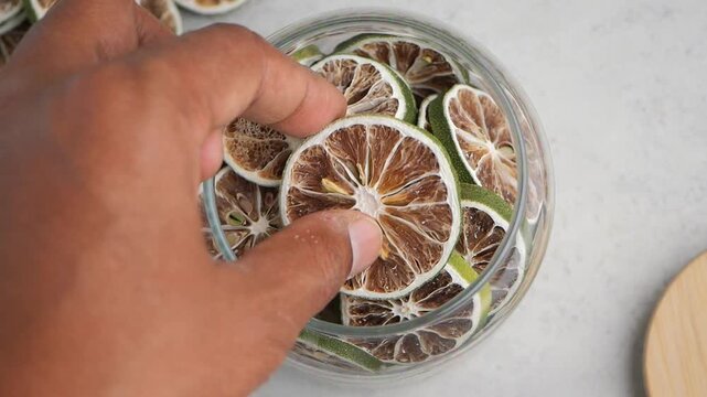 Slices of dried lime in a glass jar
