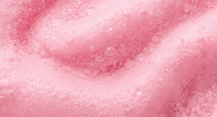 Obraz premium Soft pink foam macro close-up featuring a smooth texture and abstract bubble pattern suitable for creative backgrounds