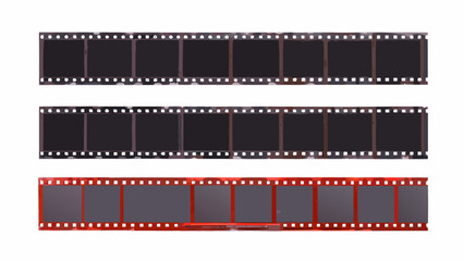 Obraz premium Three strips of photographic film two black and white and one color