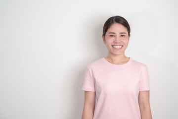Fototapeta premium Adult woman with pink Shirt for Pink October Breast Cancer Awareness month, May Women Health, women rights, Empowerment, March International Women day, February Valentine, May International Mother