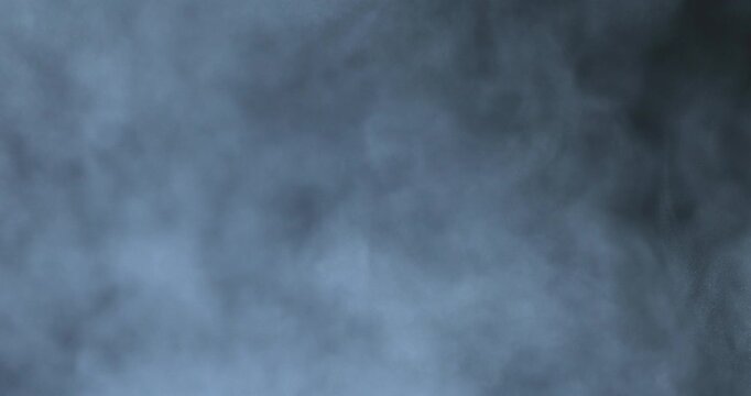 White powder dust drifting and dispersing into soft airborne clouds in slow motion. Smoke, Mist, Abstract, Smooth, Particles, Airy texture ideal for backgrounds, overlays, and creative visual effects