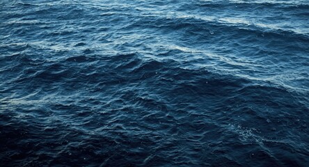 Fototapeta premium Undulating sea waves moving evenly across the large ocean area