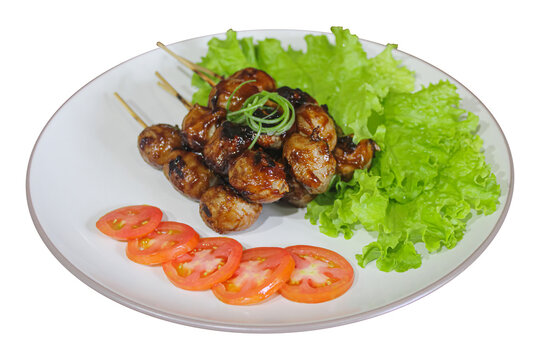 Grilled Beef Meatballs Satay with Sweet Soy Sauce and Fresh Vegetables