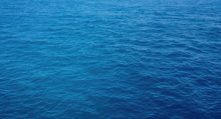 Obraz premium tranquil marine horizon with vibrant blue water texture background