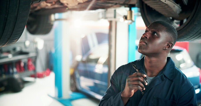 Mechanic, thinking and black man with inspection in car repair shop for diagnostic, transport or calibration. Engineering, maintenance or motor technician with person in garage for service report