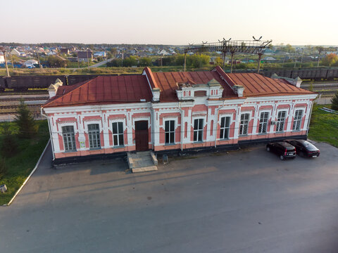 Golyshmanovo, Russia - August 21, 2021: High-angle drone shot of Golyshmanovo railway station in Golyshmanovo urban-type settlement, Tyumen region, Russia, on a sunny summer day. The image captures