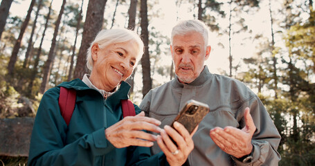 Hiking, old couple and happy with smartphone for map, talk and search for travel destination on...