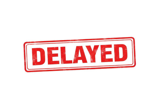 Red stamp with the word delayed indicating a postponement or delay