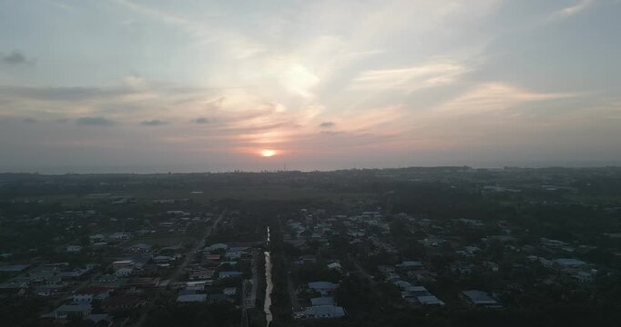 Beautiful Sunset Aerial Drone View At Miri Pujut Sarawak,Golden Hours During Evening Summer With View Of River And Green Tress