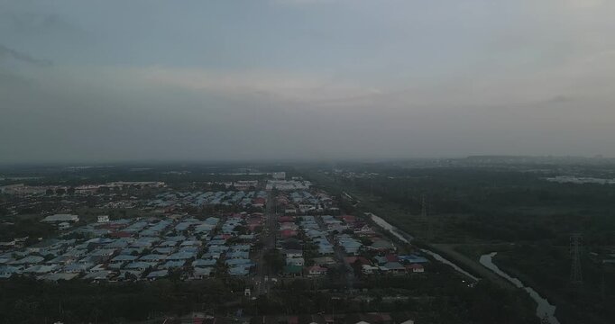 Beautiful Sunset Aerial Drone View At Miri Pujut Sarawak,Golden Hours During Evening Summer With View Of River And Green Tress