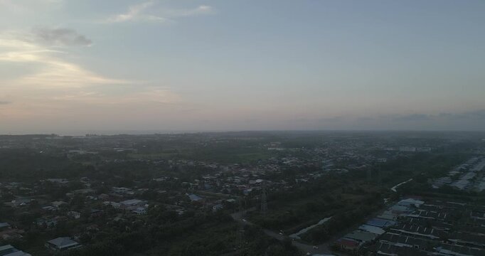 Beautiful Sunset Aerial Drone View At Miri Pujut Sarawak,Golden Hours During Evening Summer With View Of River And Green Tress