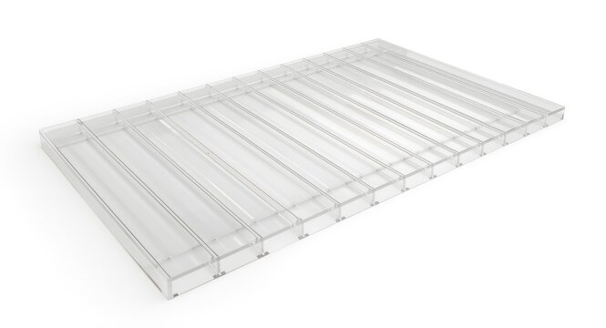 Translucent polycarbonate roof panels laid out on a clean white background
