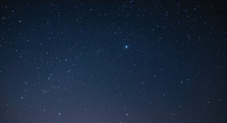 Fototapeta premium sparkling star-filled sky glowing on a calm night
