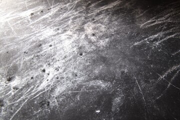 Obraz premium Dark surface with scratches and dust creates raw, tactile feel,