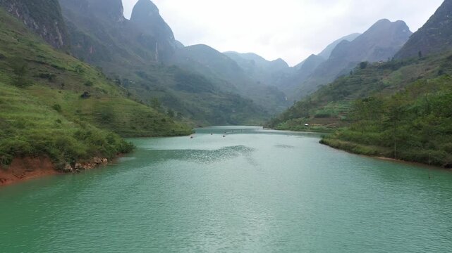 Aerial view of Nho Que River flowing through deep Tu San Canyon in Ha Giang