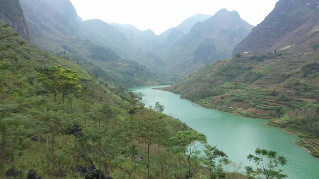Aerial view of Nho Que River flowing through deep Tu San Canyon in Ha Giang