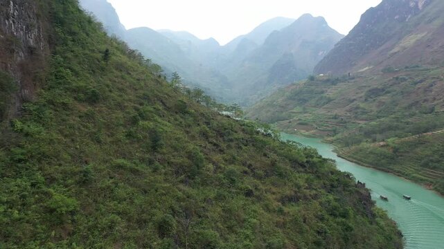 Aerial view of Nho Que River flowing through deep Tu San Canyon in Ha Giang