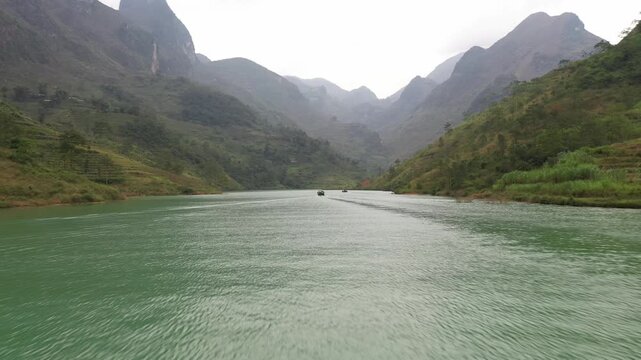 Aerial view of Nho Que River flowing through deep Tu San Canyon in Ha Giang