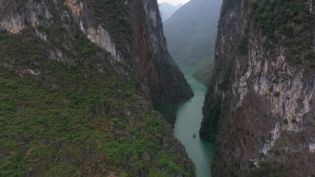 Aerial view of Nho Que River flowing through deep Tu San Canyon in Ha Giang
