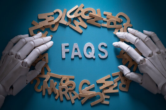 Artificial Intelligence Robot Hands with FAQs Sign on Blue Background
