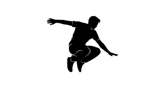 Silhouette of a person performing a parkour jump with free running