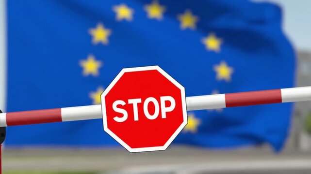 Flag of the European Union EU, barrier and stop sign	