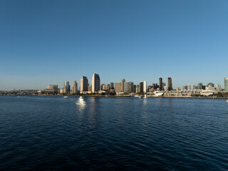 San Diego city skyline across the blue waters of the harbor