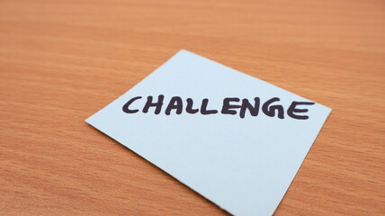 Challenge Note on Wooden Background
