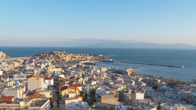 Kavala Greece City Landscape Panorama with Blue Sky and Ferry in Port